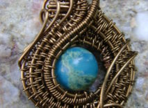 Antique Bronze Wire-Wrapped Pendant – Blue & Green Round Stone Bead