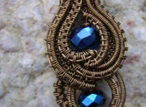 Antique Bronze Wire-Wrapped Pendant – Blue Faceted Round Glass Beads